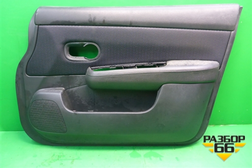 Обшивка двери передней правой под электрику (80910EL11A) для Nissan Tiida (C11X) с 2004-2013г